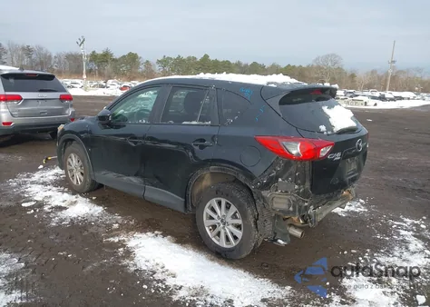 2014 Mazda Cx-5 Touring from USA, damaged, VIN JM3KE4CY9E0429395